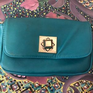 Charming Charlie cross body bag teal color